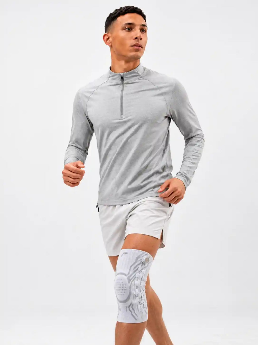 Genouillère de compression réglable respirante pour protection complète